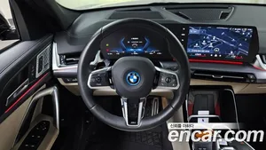 BMW iX2, 2024 — миниатюра 19