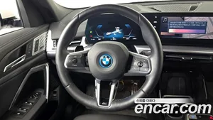 BMW iX2, 2024 — миниатюра 13